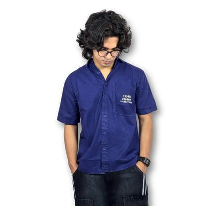 Oversized Washed Graphic Shirt – Navy Blue (Distressed Pocket & Printed Text)