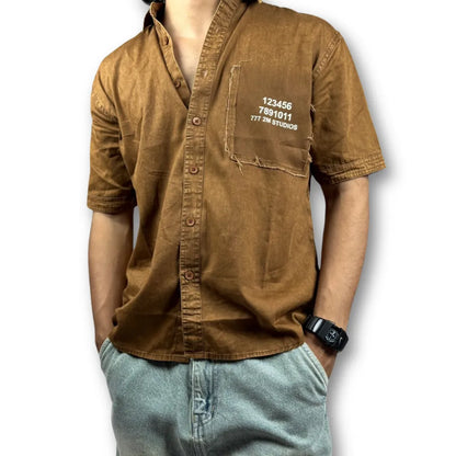 Oversized Washed Graphic Shirt – Rust Brown (Distressed Pocket & Printed Text)